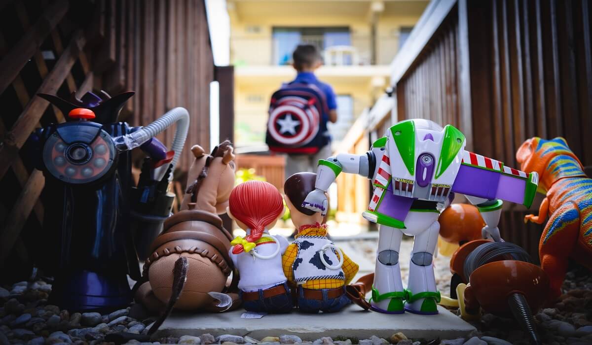 A group of toys from a movie watching a child.